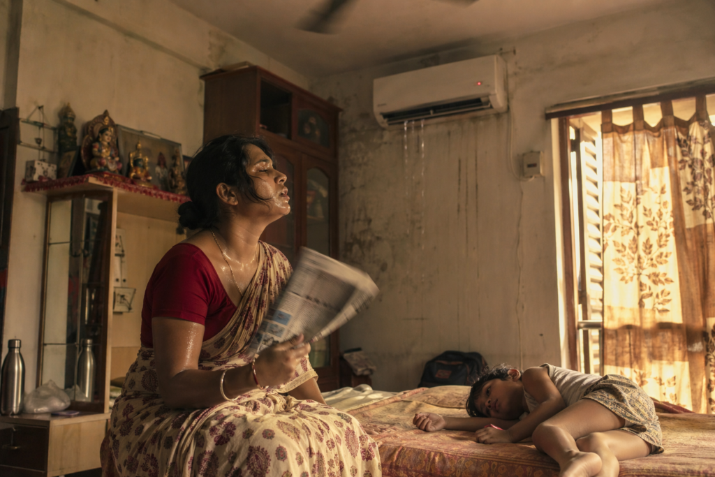 AC repairs cost in Kolkata -- faulty split AC dripping water in a Bengali home during 40 degree summer heatwave